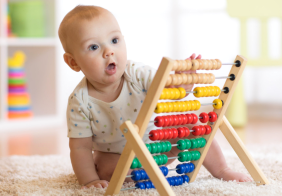 infant with toy