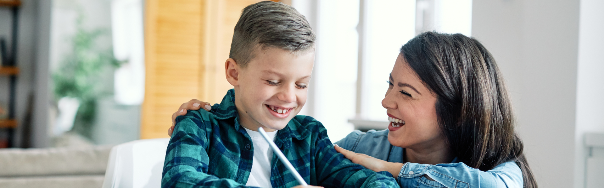 child and parent smiling